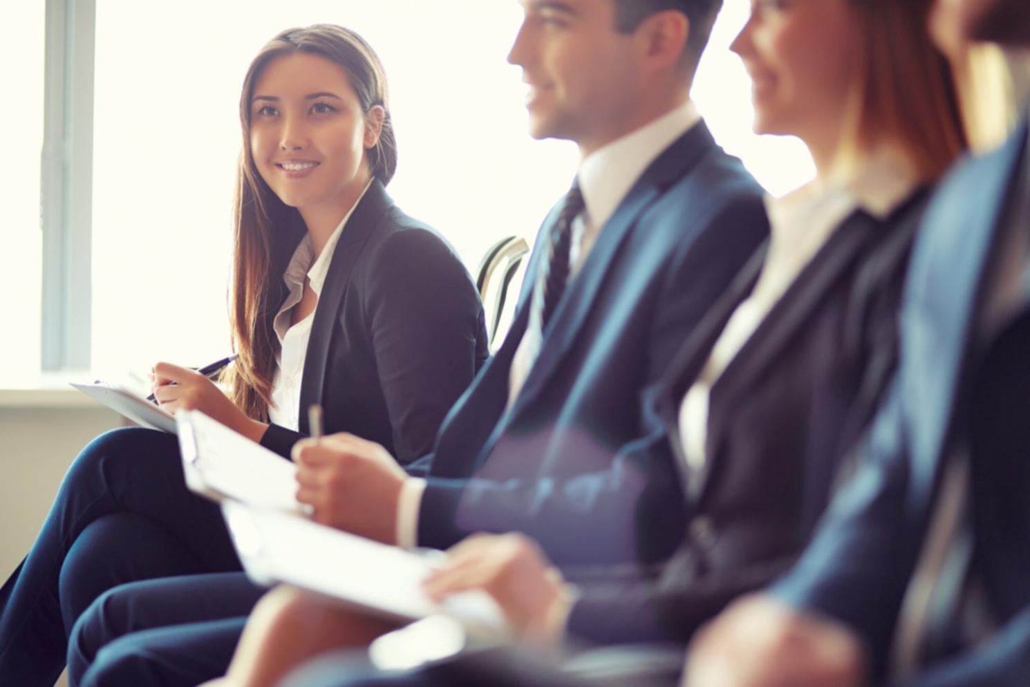 Trader analyzing risk metrics and position sizing on laptop